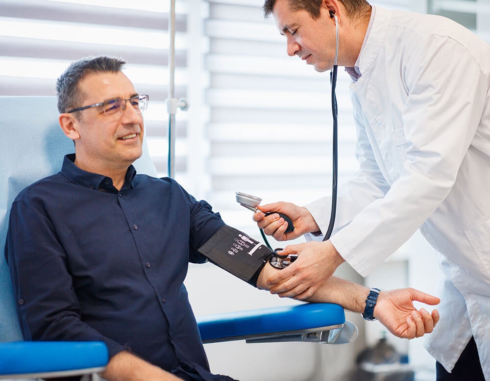 Gentleman having his blood pressure taken