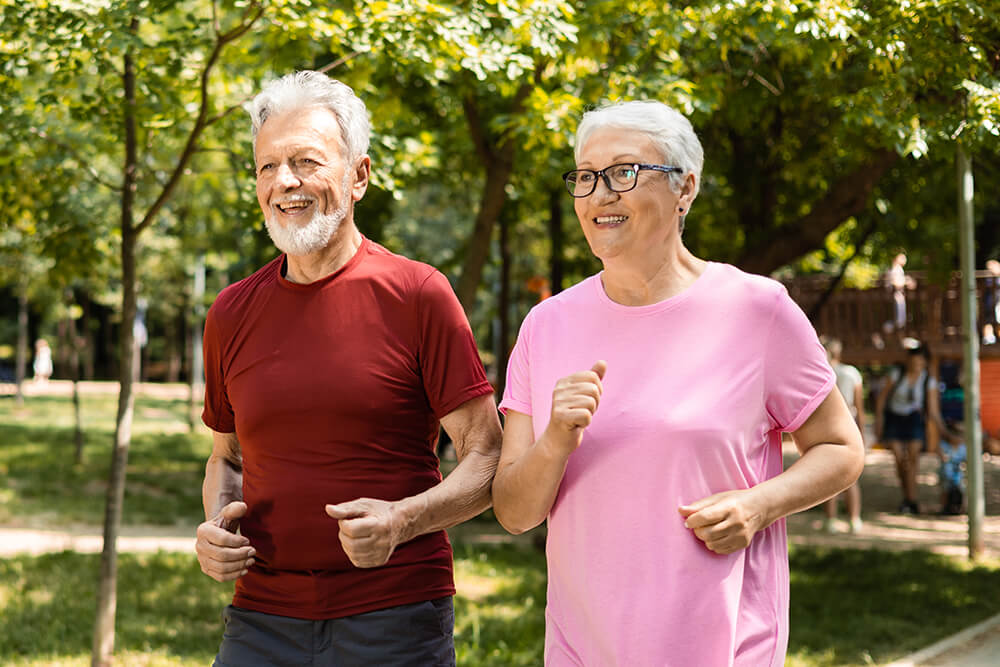 A couple jogging in the park
